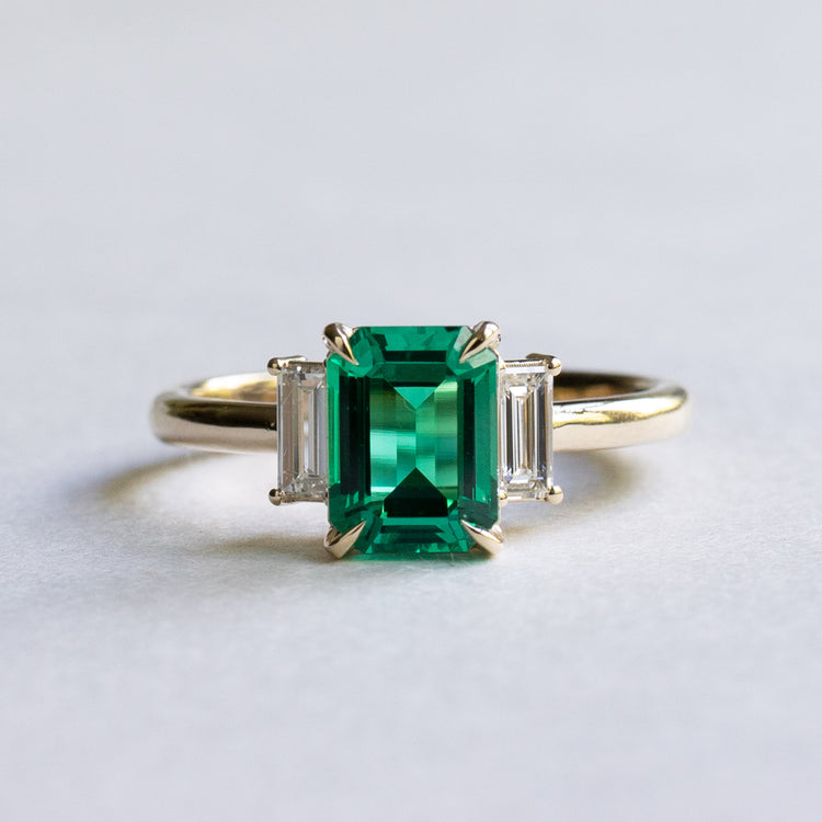 18K 1.4 CT Emerald Three Stone Ring