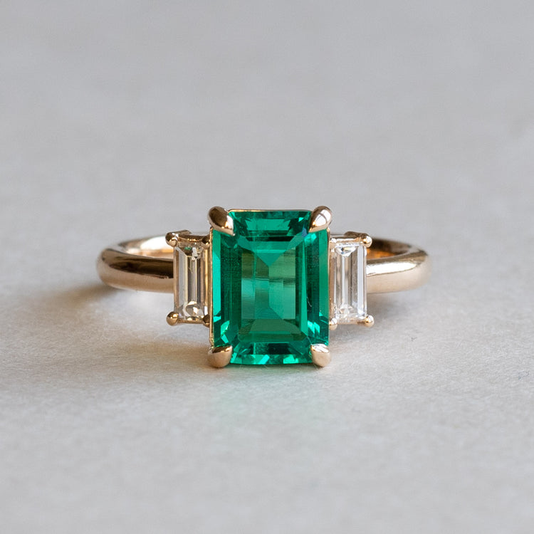 18K 1.4 CT Emerald Three Stone Ring